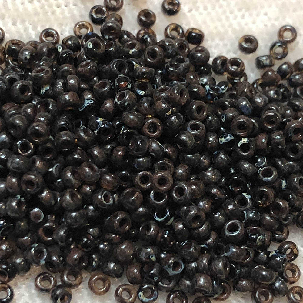 11/0 Transparent Dark Topaz Picasso 4502 Japanese Seed Beads