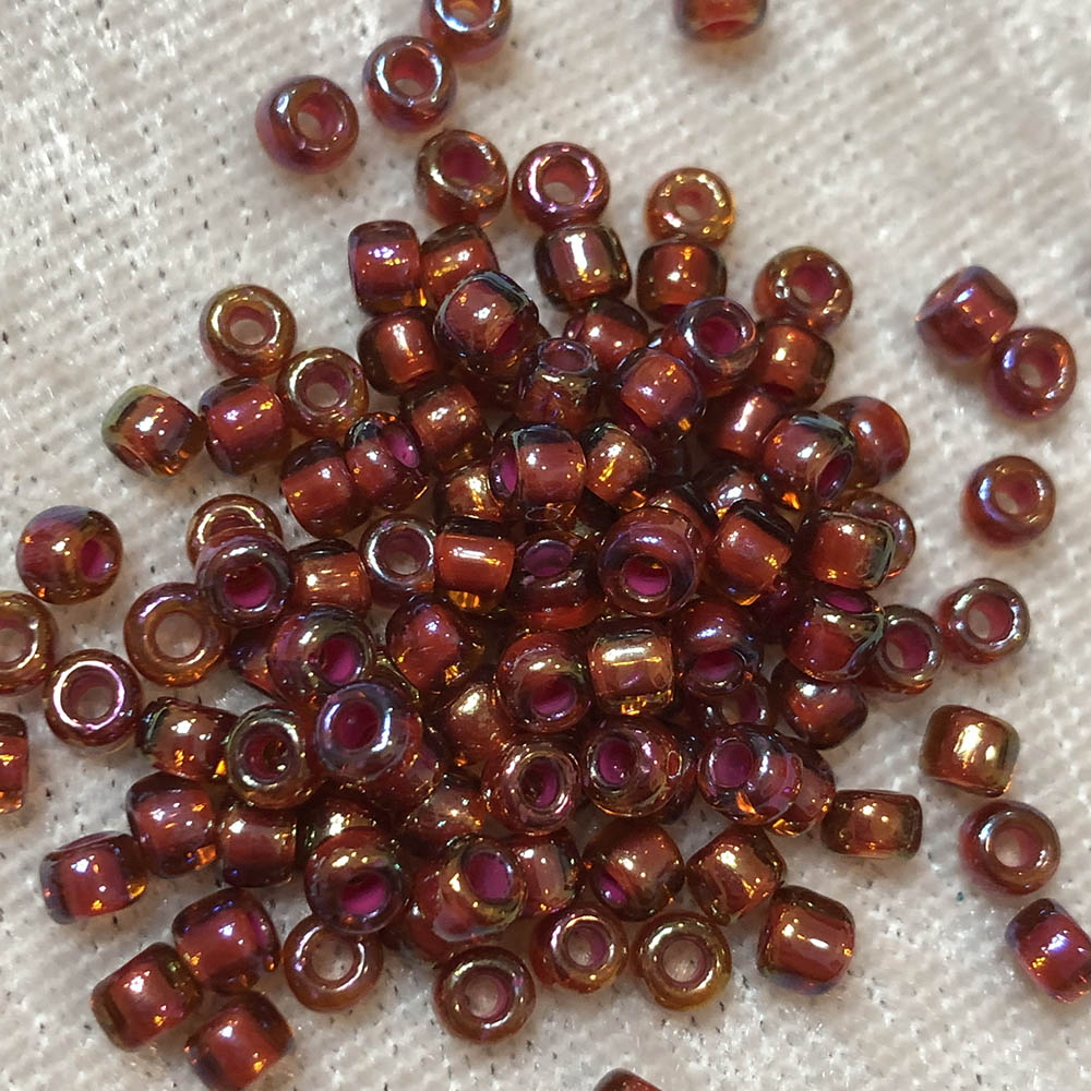 6/0 Colorlined Light Garnet Rainbow 389A Japanese Seed Beads