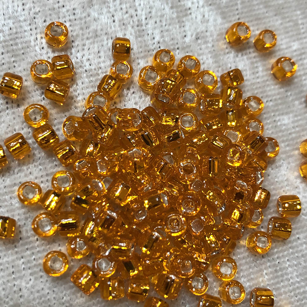 6/0 Transparent Orange Silverlined 9 Japanese Seed Beads