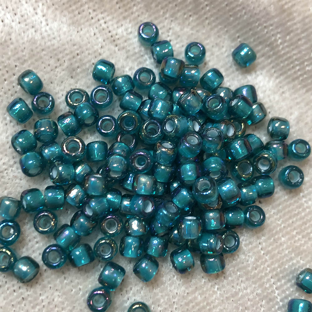 6/0 White Lined Teal AB 331 Japanese Seed Beads