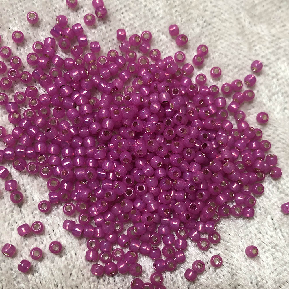 11/0 Silver Lined Transparent Alabaster Hot Fuchsia 584A Japanese Seed Beads