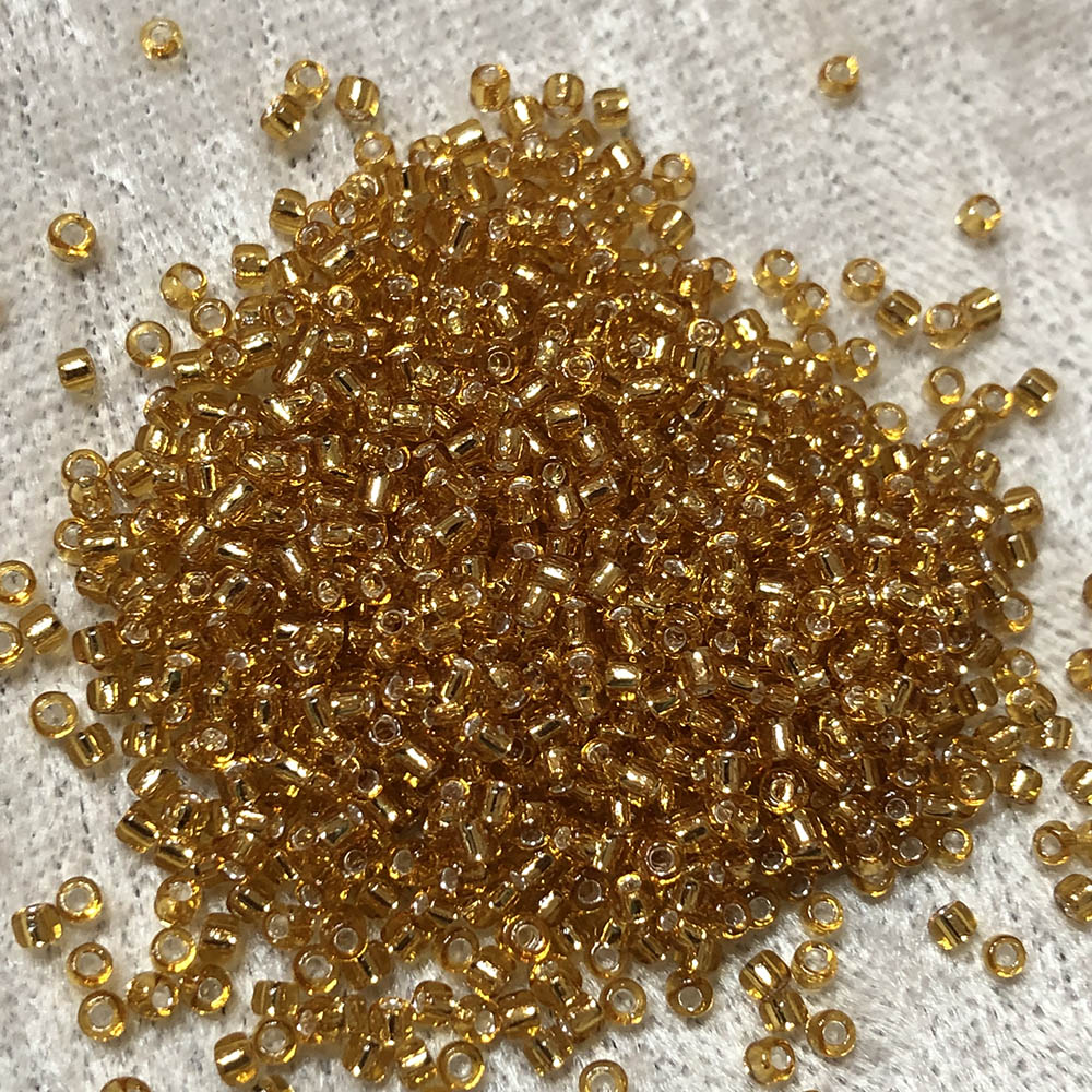 11/0 Silver Lined Transparent Amber 4 Japanese Seed Beads