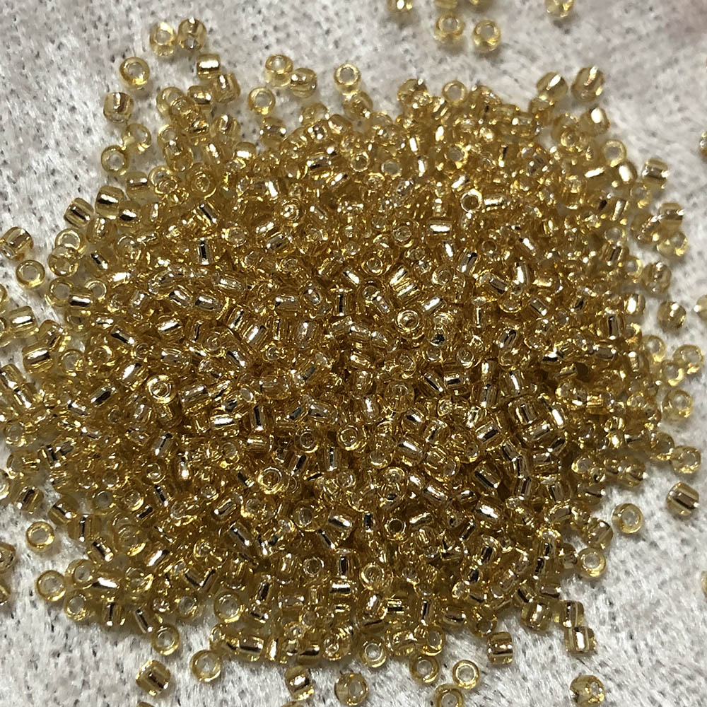 11/0 Transparent Silver Lined Light Gold 3 Japanese Seed Beads