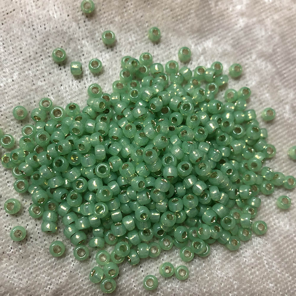 8/0 Gold Lined Waxy Light Green 572A Japanese Seed Beads