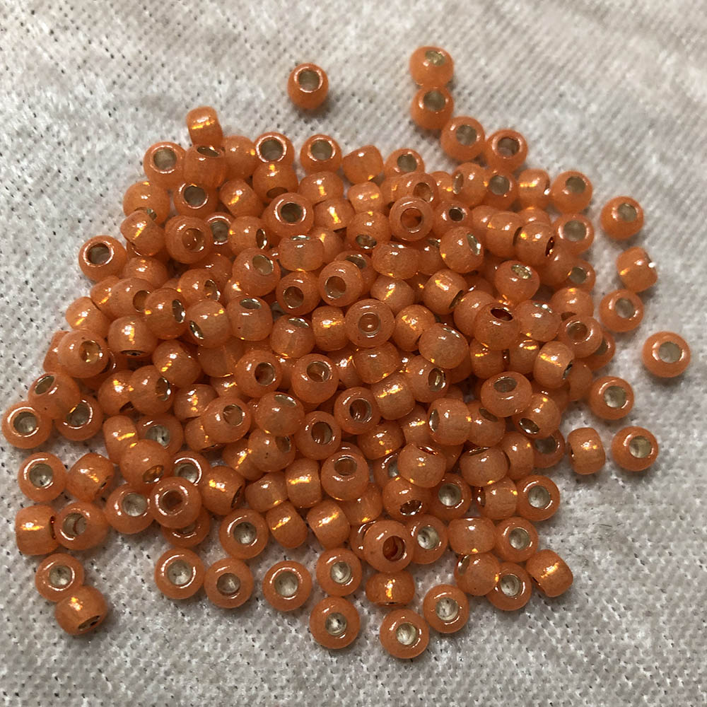 6/0 Gold Lined Alabaster Pumpkin Opal 553A Japanese Seed Beads