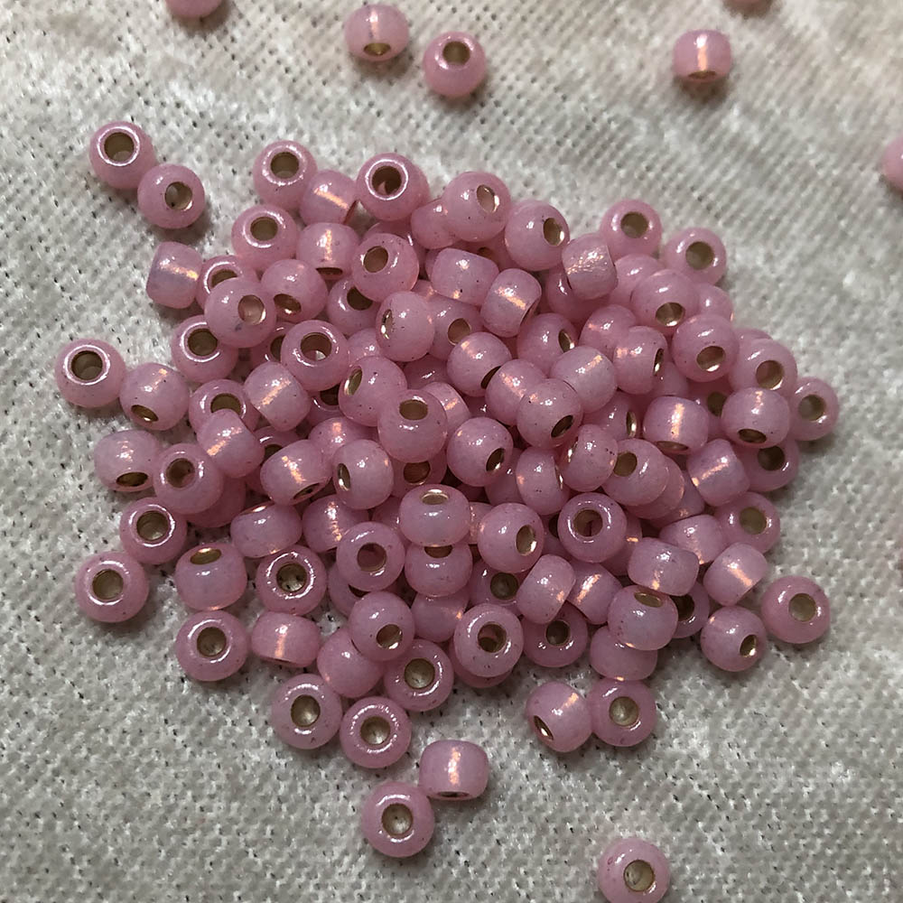 6/0 Gold Lined Waxy Pink 555 Japanese Seed Beads