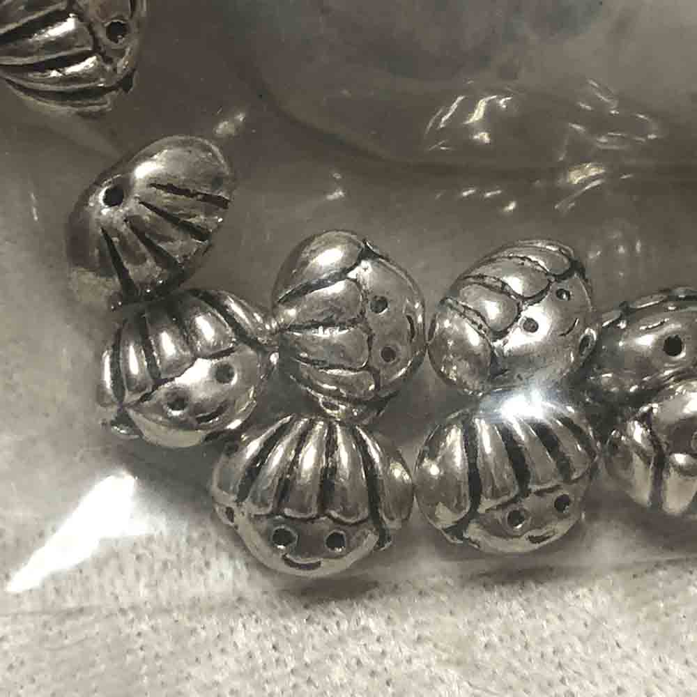 Pewter Face Beads