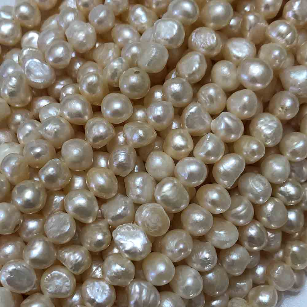 Medium Large Pink Cream Semi-Smooth Semi-Round Cultured Pearls