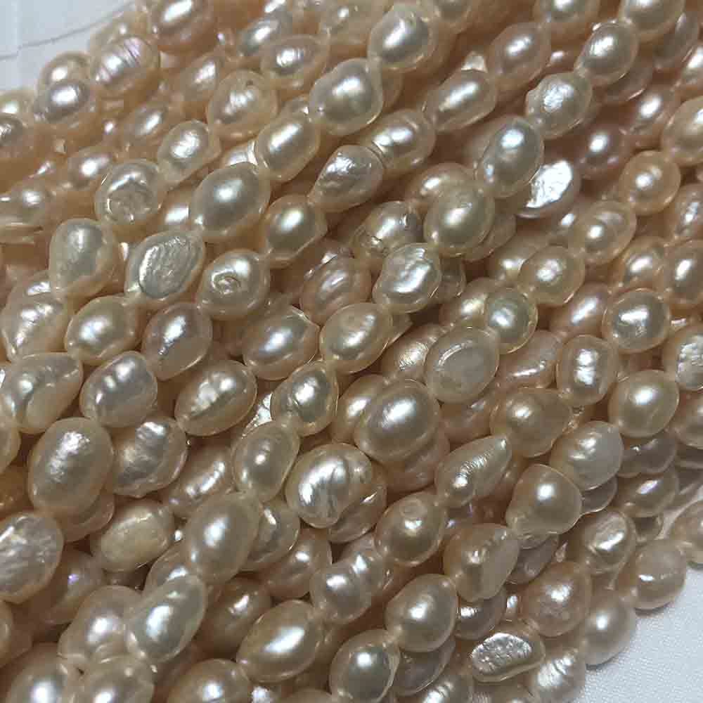 Medium Pink Cream Semi-Smooth Oval Cultured Pearls