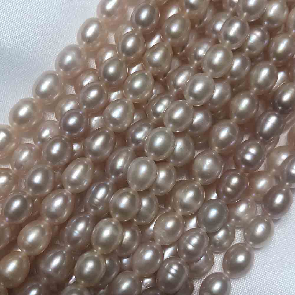 Medium Small Pink Cream Oval Shaped Cultured Pearls