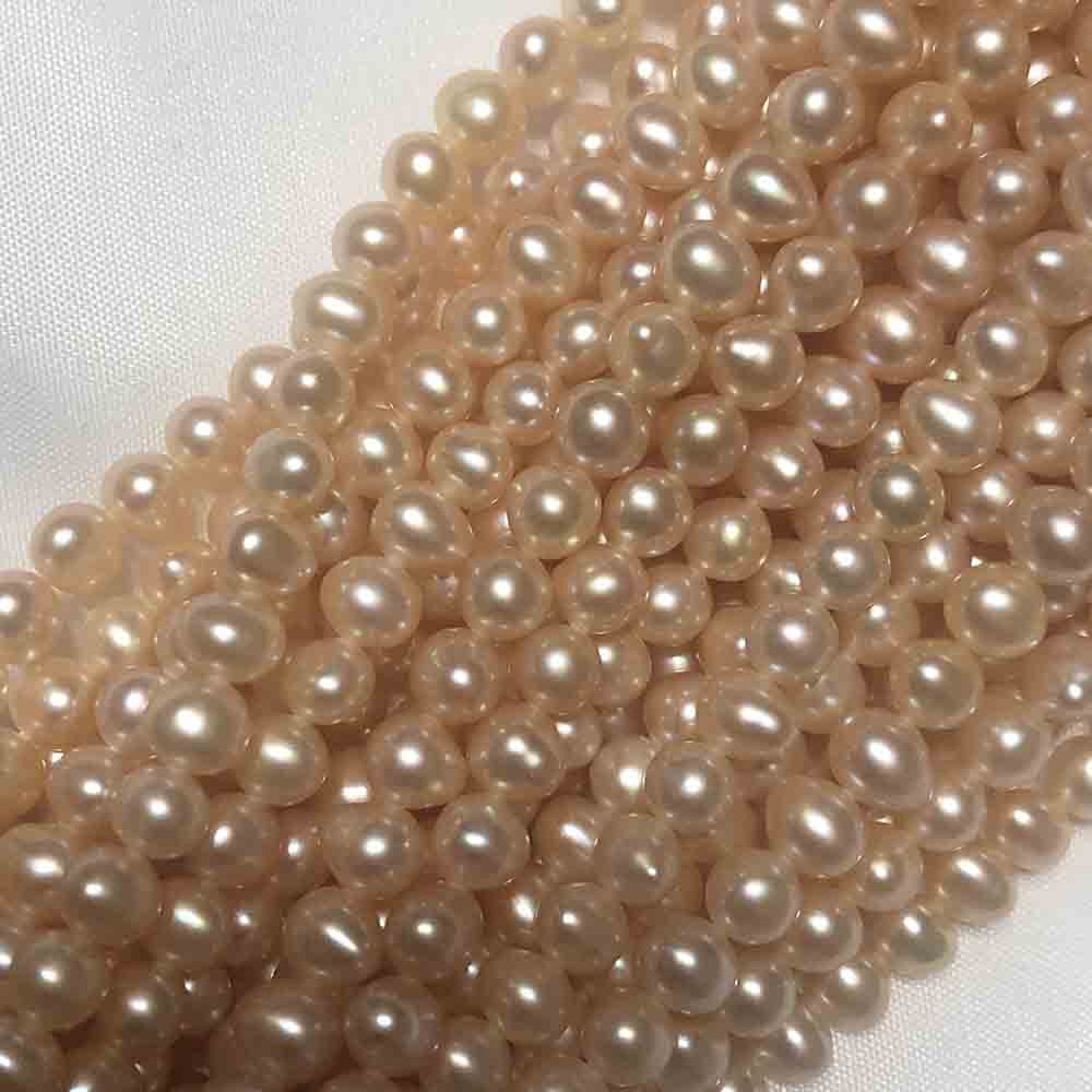 Small Orange Cream Semi-Round Cultured Pearls