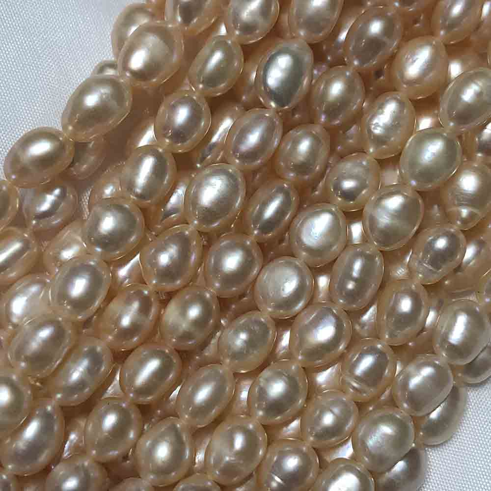 Medium Orange Cream Oval Shaped Cultured Pearls