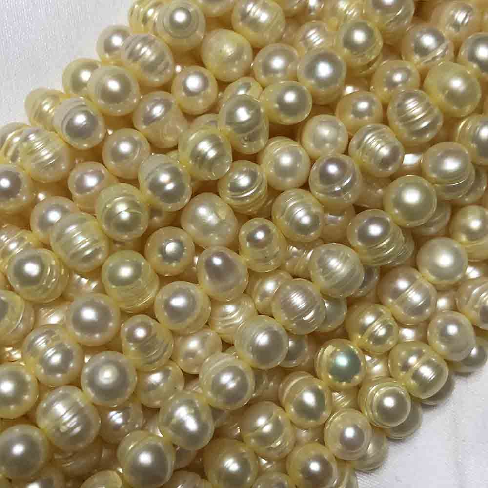 Medium Small Light Yellow Cream Irregular Oblong Cultured Pearls