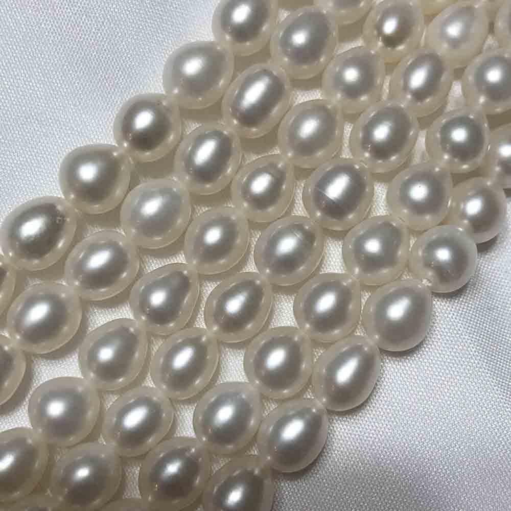 Medium White Iris Drop Shape Cultured Pearls