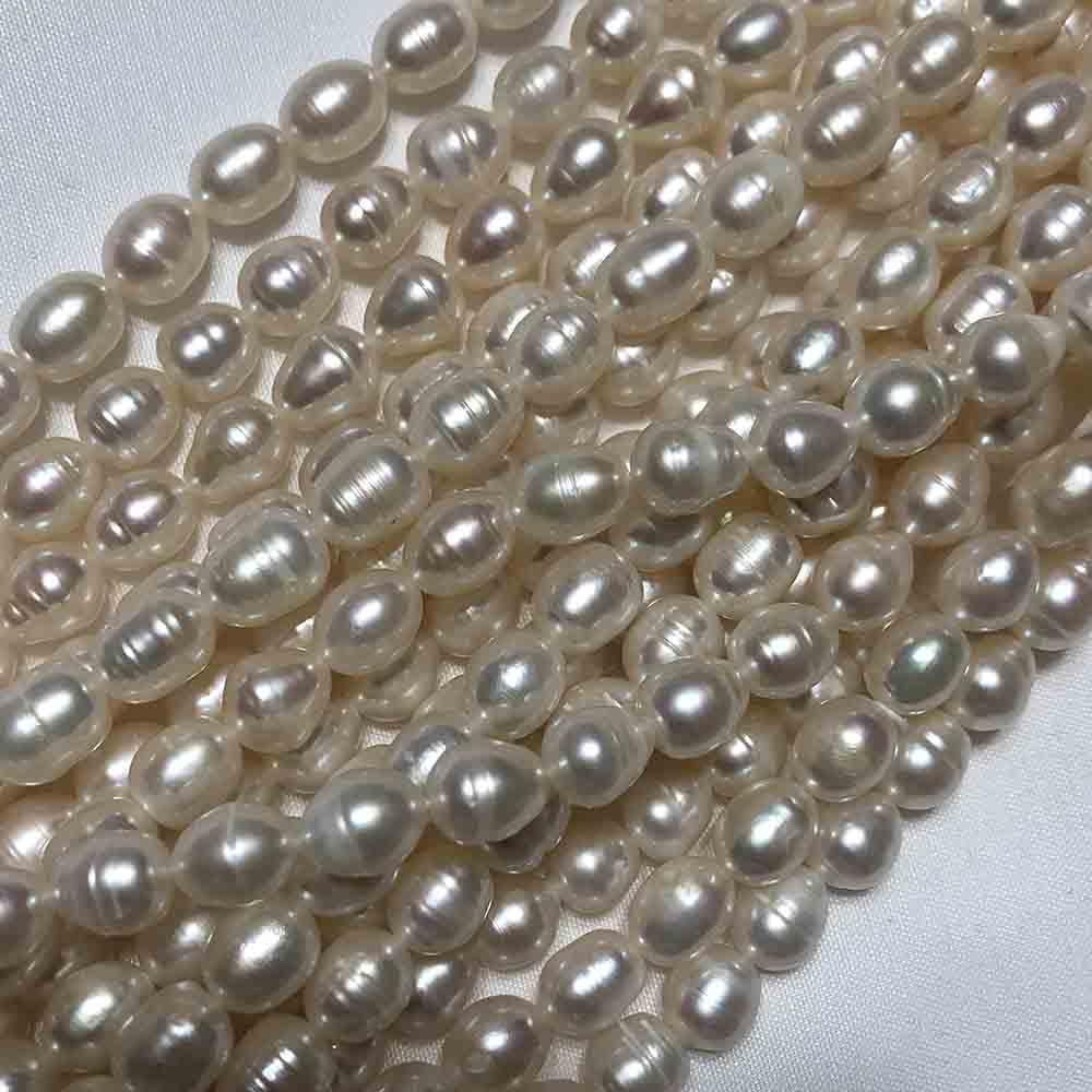 Large Peach 7mm Rice Shape Slightly Irregular Cultured Pearls