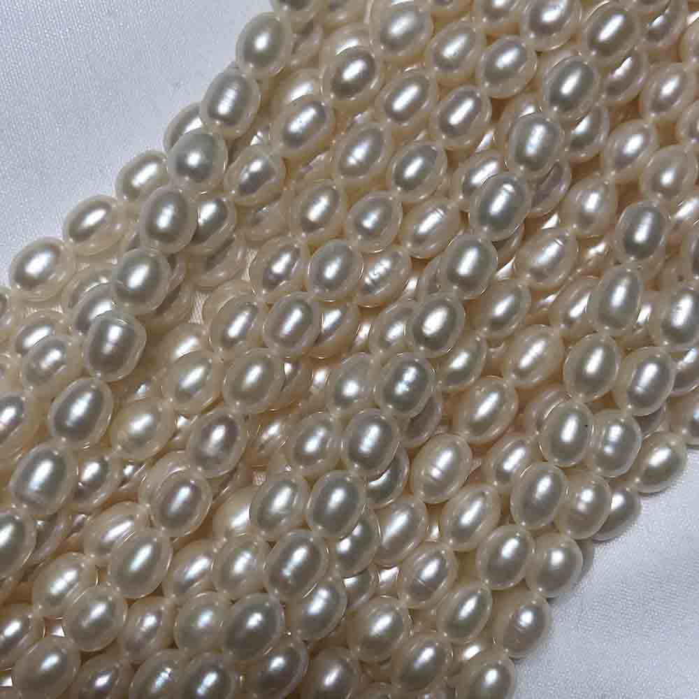 Medium Peach 5.5mm Rice Shape Cultured Pearls