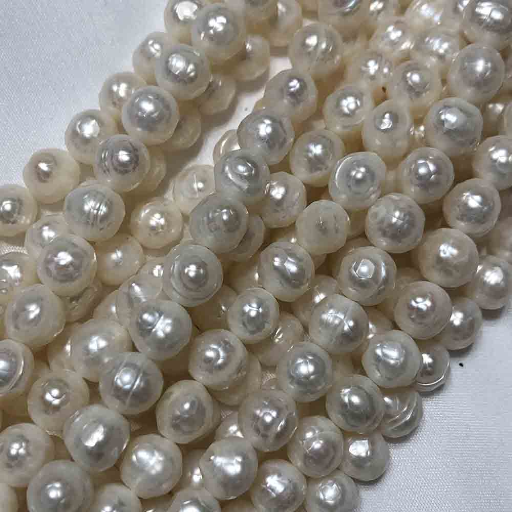 Medium Cream Faceted Round Cultured Pearls