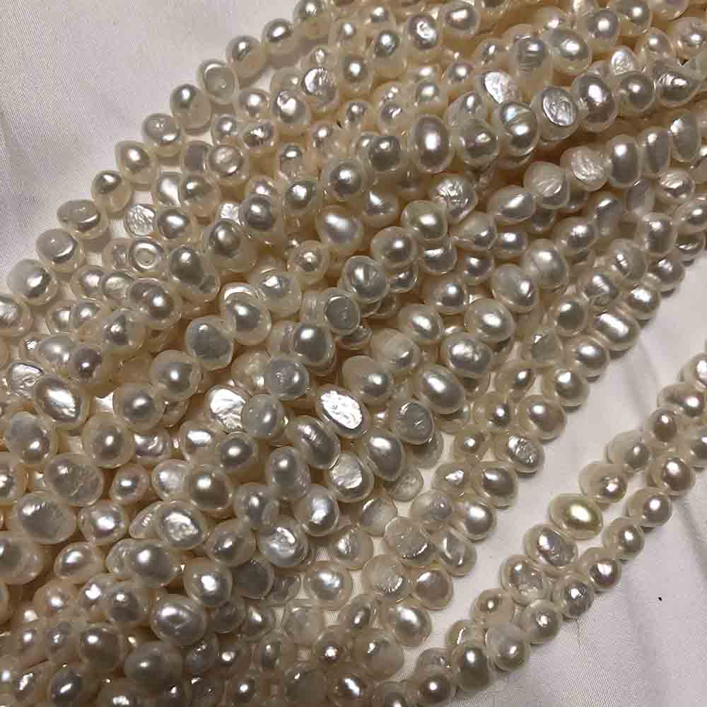 Medium Cream Side Drilled Irregular Oblong Shape Cultured Pearls