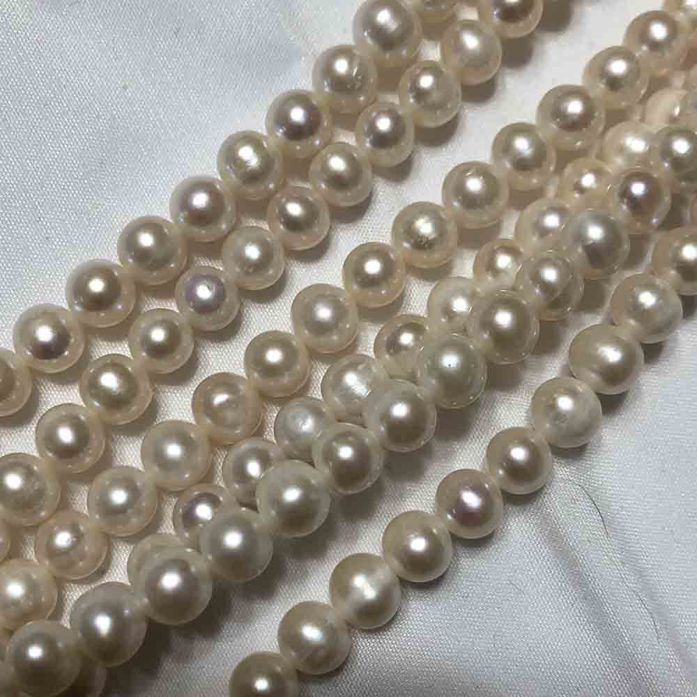 Medium Cream Mostly Round Cultured Pearls