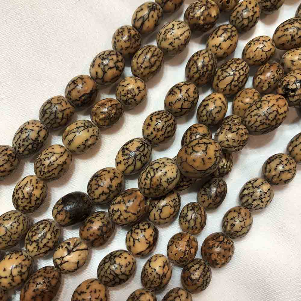 Medium Light Orange Beetle Nut Oval Shaped Beads