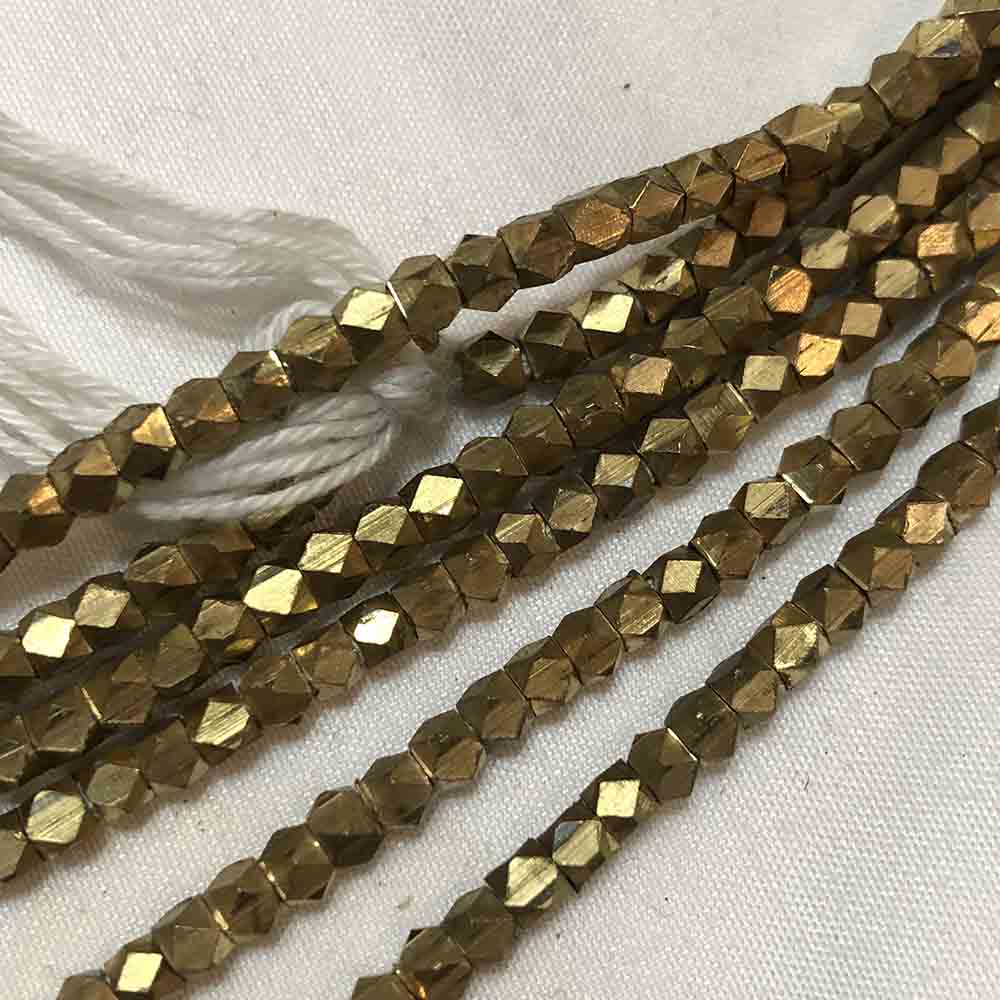 Small Gold Hued Faceted Metal Beads