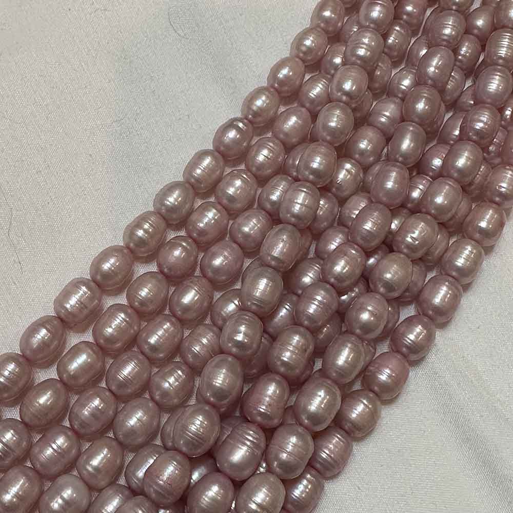 Large Iridescent Mauve Oval Shape Pearls