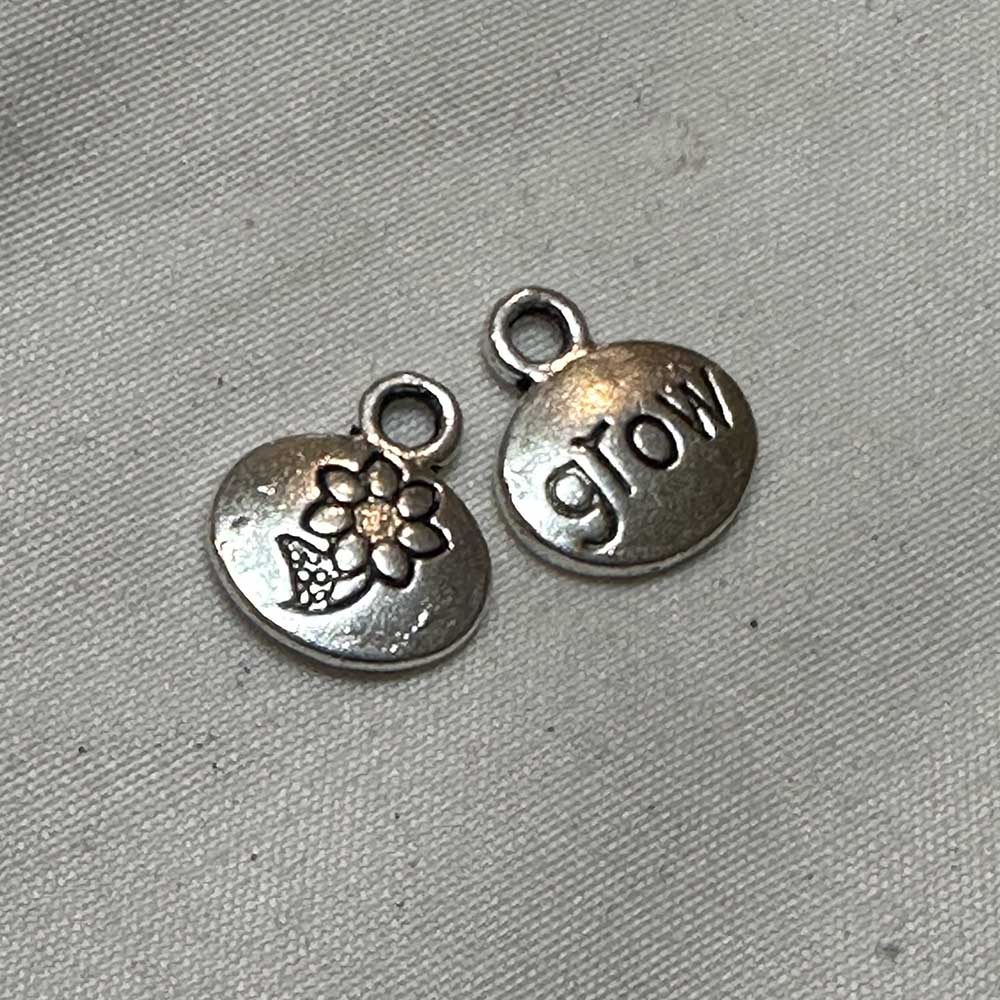 Double Sided Grow Flower Oval Charm Silver Finish