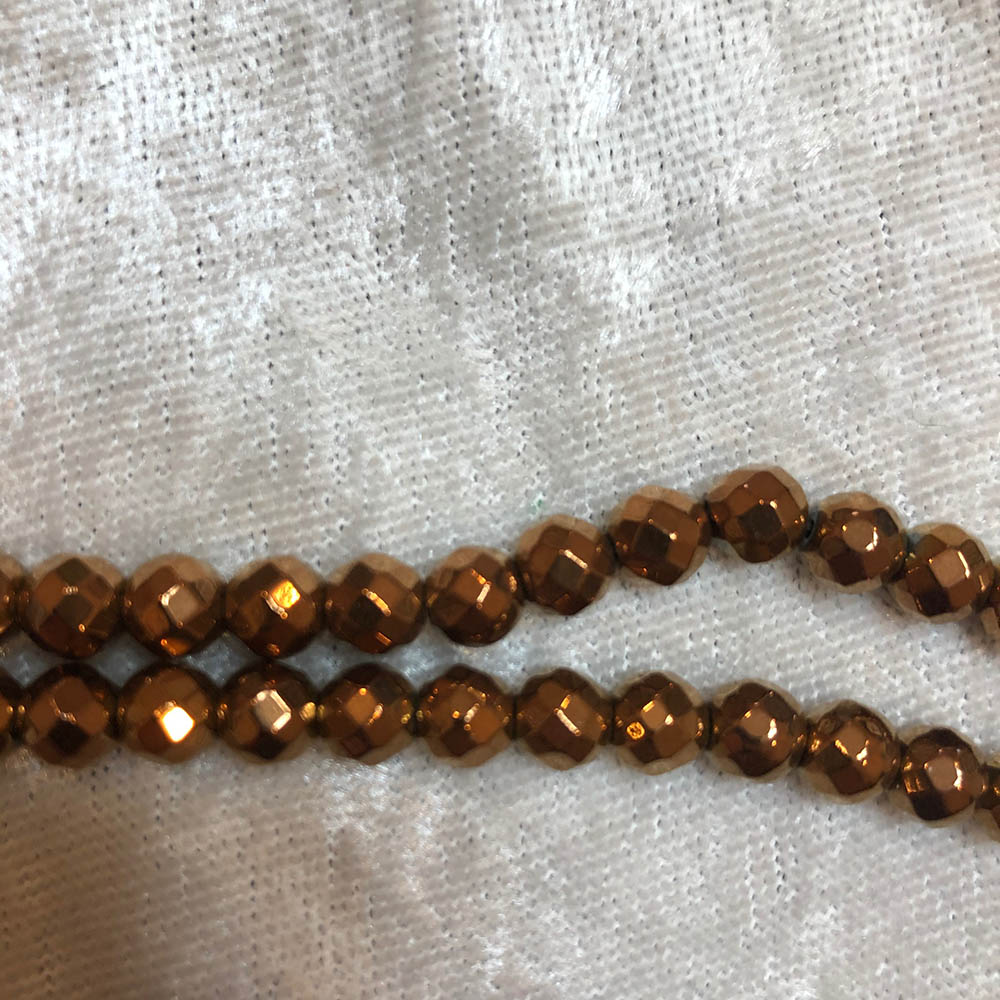 1 strand Copper Plated Pyrite Faceted Beads 6mm.