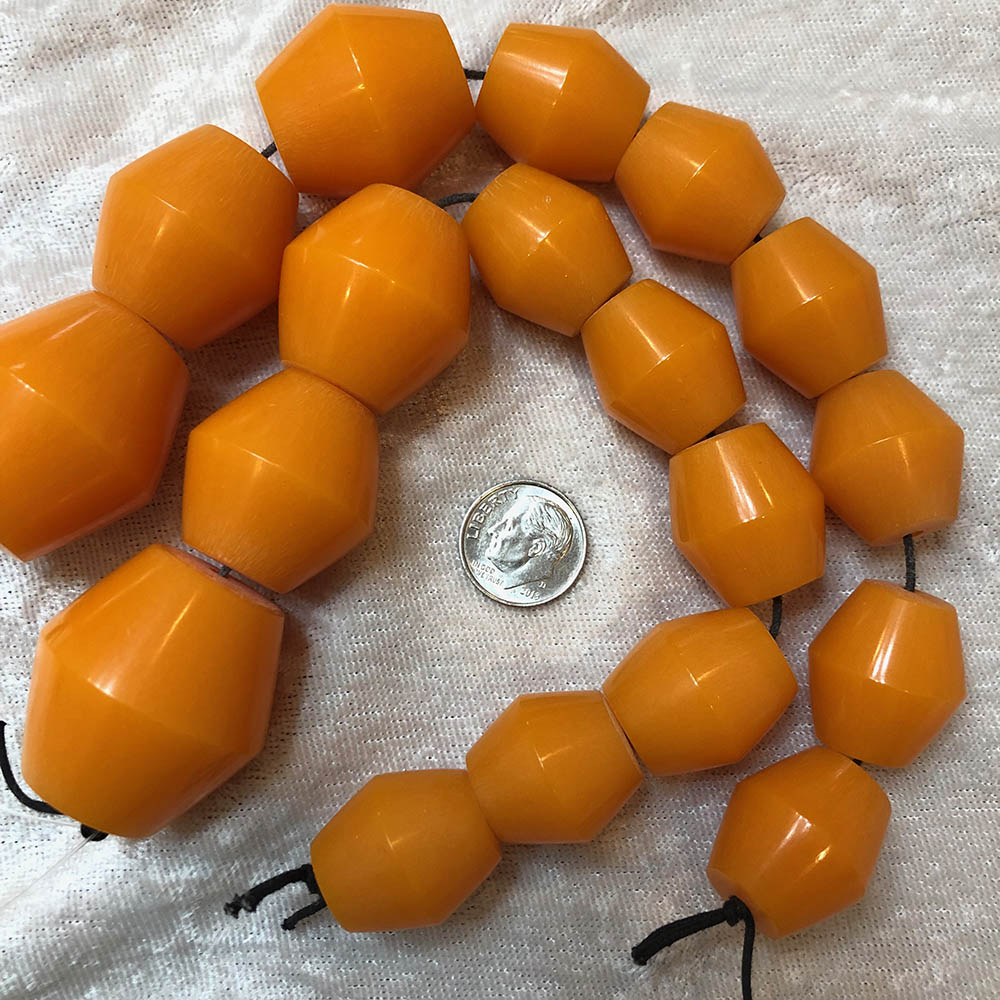 Egg Yolk Amber Graduated Bicone Beads