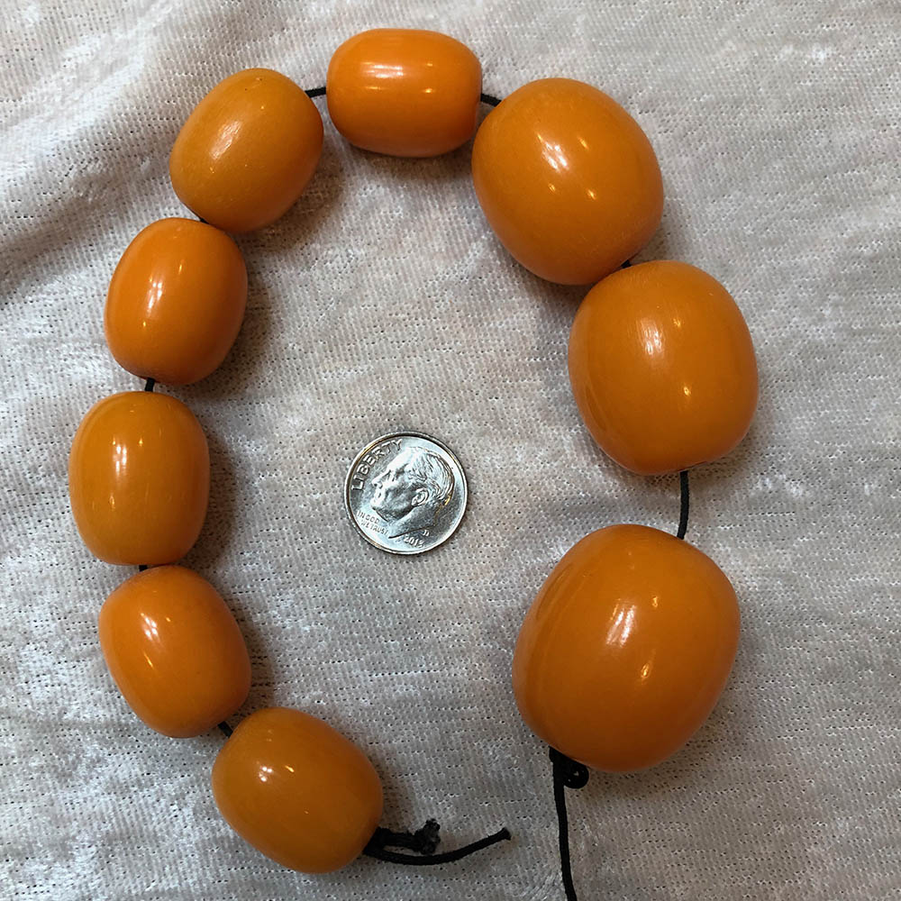 Egg Yolk Amber Graduated Oval Beads