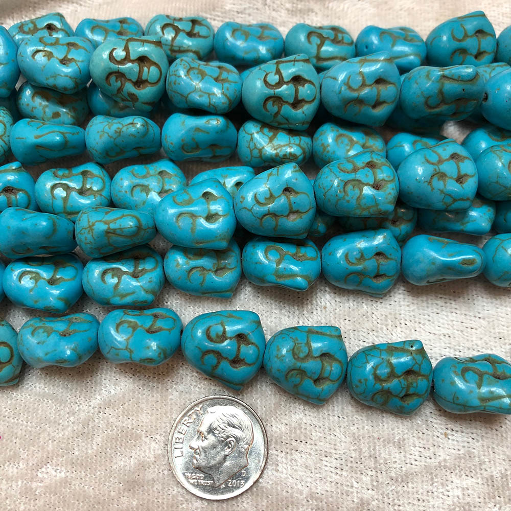 Turquoise Blue Howlite Two Sided Buddha Head Carved Beads